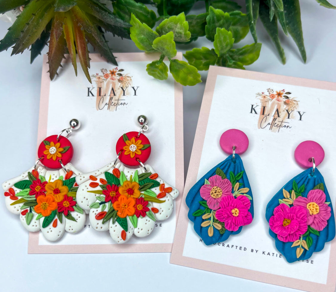 Bright Orange Scalloped Flowers with Silver Stud
