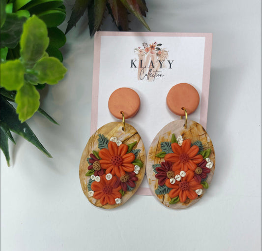 Clip On Rustic burnt orange rust floral polymer clay earrings