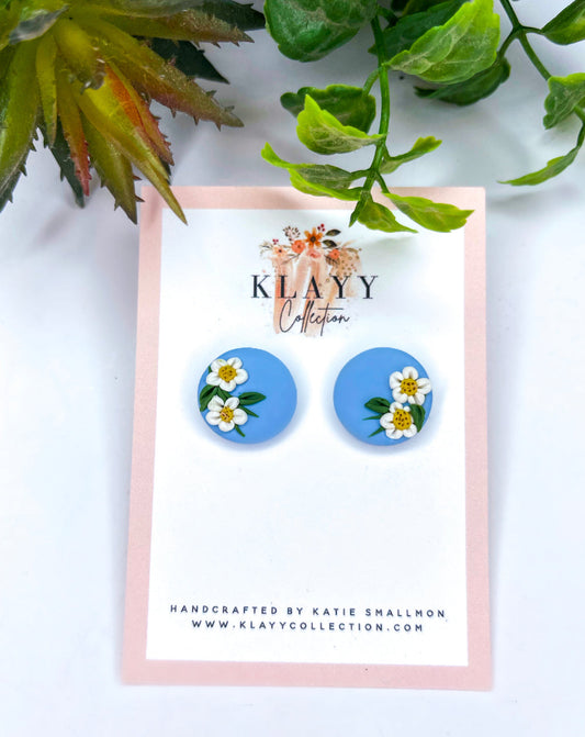 Clip On Light Blue Daisy Studs